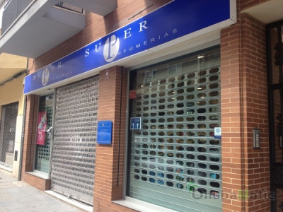 Persianas automáticas de seguridad instalada en Superperfumerías en Huelva.